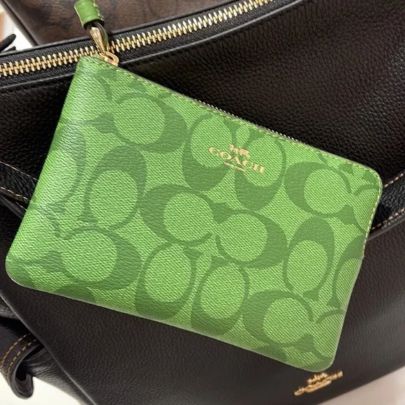 Coach Corner Zip Wristlet In Signature Canvas 
Im/Neon Green - Picture 6 of 16